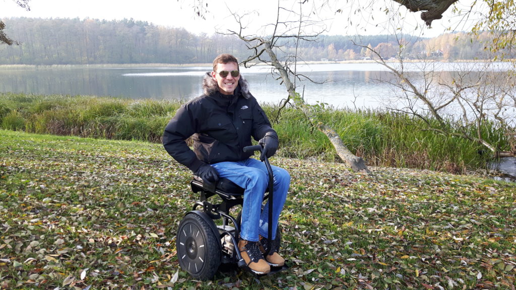 Blumil electric wheelchair by the lake