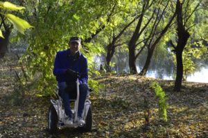 Blumil S5 electric wheelchair in a forest