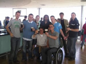 Beer enjoyed carefully on electric wheelchair