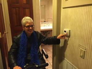 Operating an electric wheelchair in a hotel