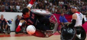 Players of electric wheelchair rugby